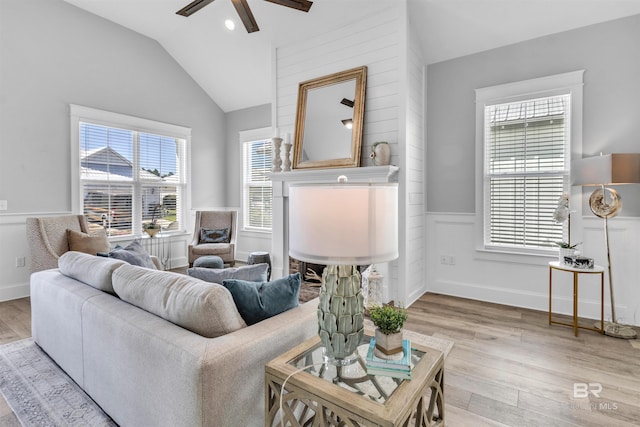 23901 Cypress Xing, Orange Beach, AL 36561 - living area with light wood-type flooring, plenty of natural light, vaulted ceiling, and ceiling fan