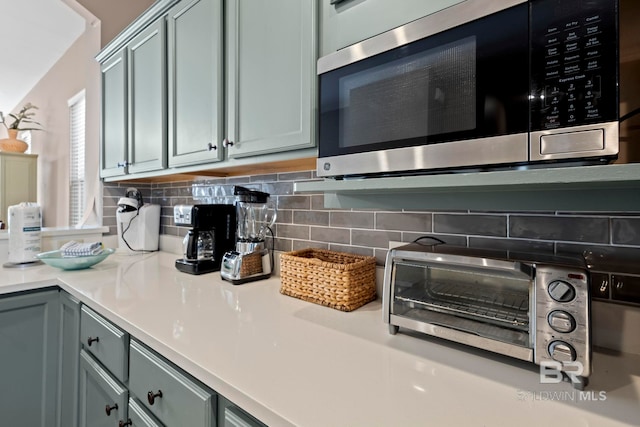 kitchen with tasteful backsplash