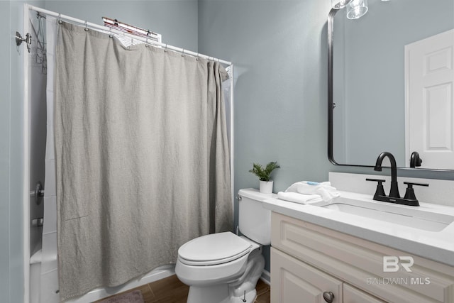 full bathroom with wood-type flooring, vanity, toilet, and shower / bathtub combination with curtain