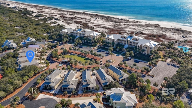 aerial view with a view of the beach and a water view