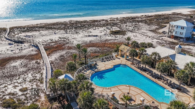 aerial view with a view of the beach and a water view