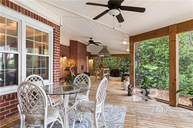 exterior space featuring ceiling fan