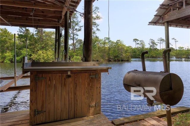 view of dock featuring a water view