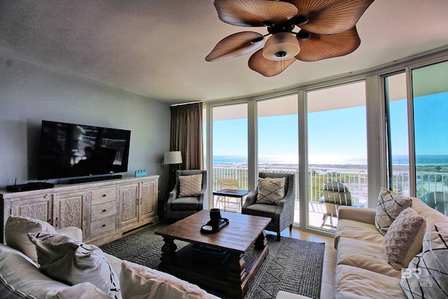 living room with floor to ceiling windows