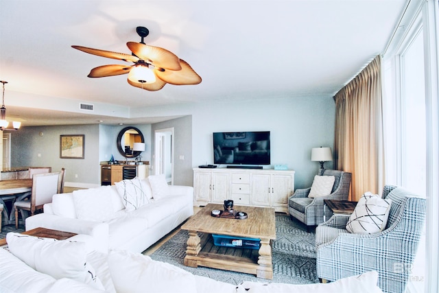 living room with ceiling fan