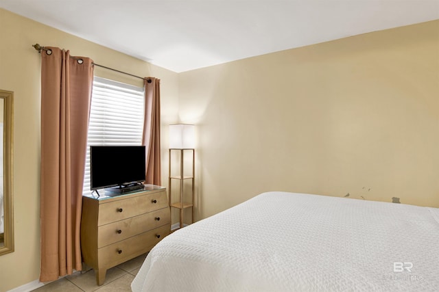 969 W Beach Blvd Unit 1503A, Gulf Shores, AL 36542 - bedroom with light tile patterned floors and baseboards