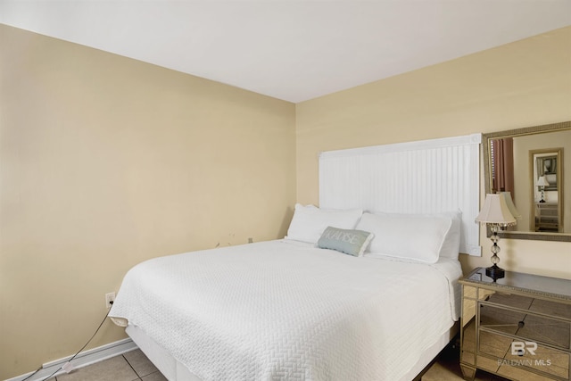 969 W Beach Blvd Unit 1503A, Gulf Shores, AL 36542 - tiled bedroom with baseboards