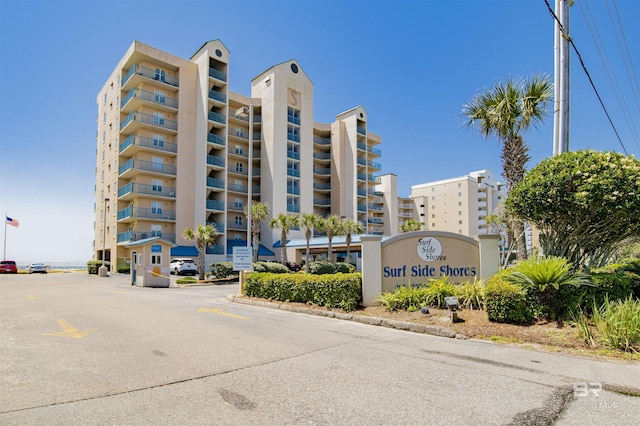 969 W Beach Blvd Unit 1503A, Gulf Shores, AL 36542 - view of apartment building / complex featuring uncovered parking