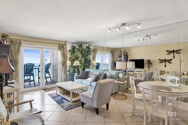 969 W Beach Blvd Unit 1503A, Gulf Shores, AL 36542 - living area featuring light tile patterned flooring and french doors