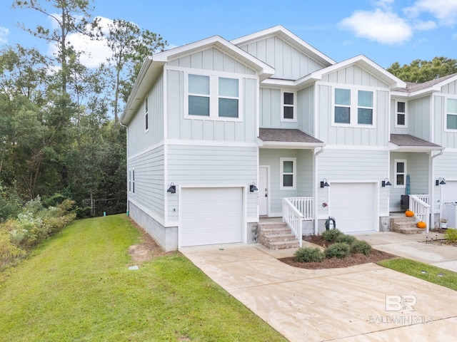 view of front of house featuring a garage and a front lawn