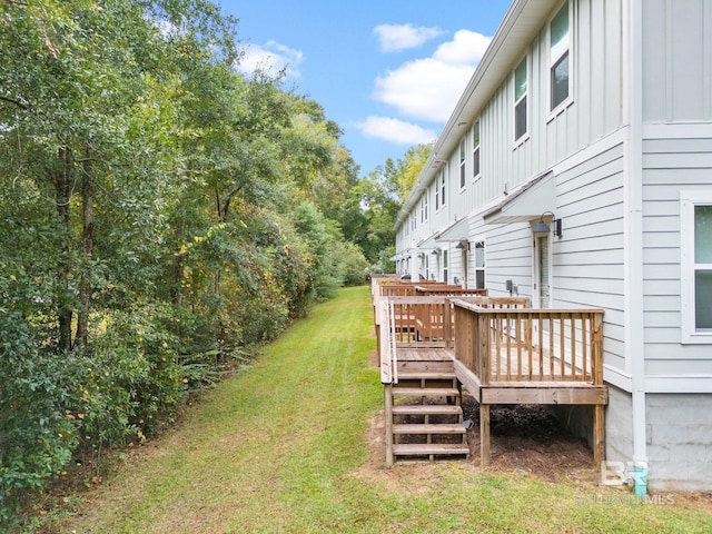 view of yard with a deck