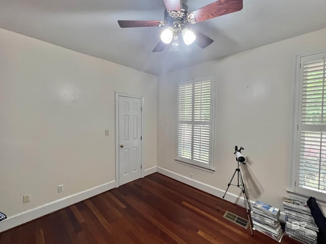 151 Mockingbird Ln, Atmore, AL 36502 - spare room with wood finished floors, plenty of natural light, baseboards, and a ceiling fan
