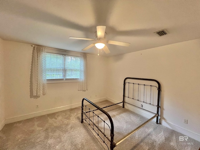 151 Mockingbird Ln, Atmore, AL 36502 - unfurnished bedroom featuring carpet flooring and baseboards