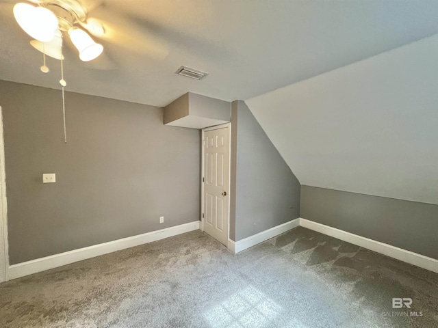 151 Mockingbird Ln, Atmore, AL 36502 - bonus room with carpet floors, ceiling fan, baseboards, and vaulted ceiling
