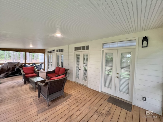 151 Mockingbird Ln, Atmore, AL 36502 - sunroom / solarium with french doors, wood-type flooring, and a wooden deck