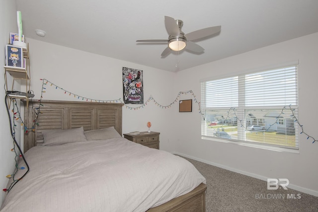 10909 Blacktail Loop, Pensacola, FL 32526 - carpeted bedroom featuring baseboards and a ceiling fan
