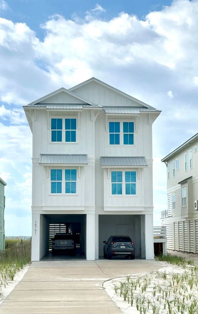 view of front of home with a carport