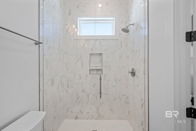 16761 Perdido Key Dr, Pensacola, FL 32507 - bathroom featuring tiled shower and toilet