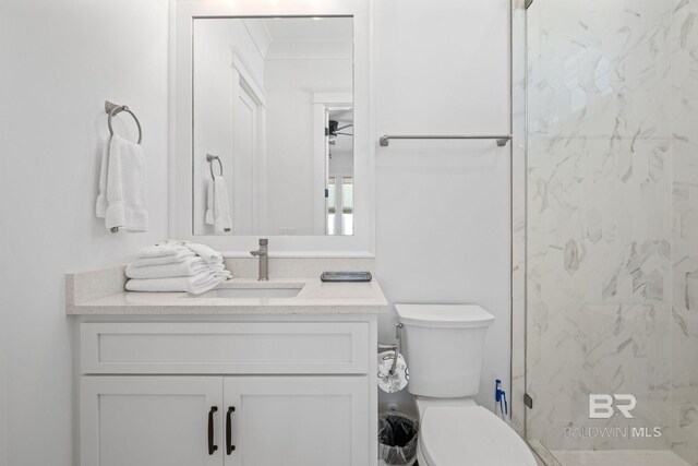 16761 Perdido Key Dr, Pensacola, FL 32507 - bathroom featuring vanity, toilet, and ceiling fan