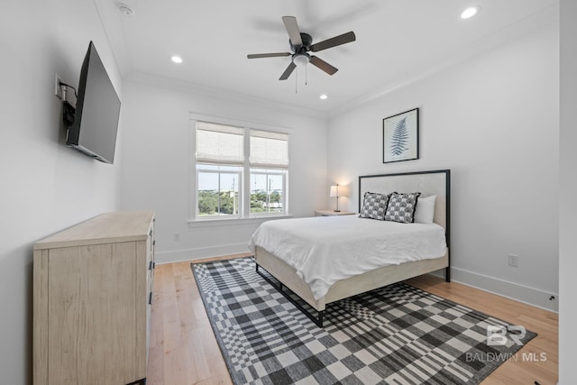 16761 Perdido Key Dr, Pensacola, FL 32507 - bedroom with crown molding, light hardwood / wood-style floors, and ceiling fan
