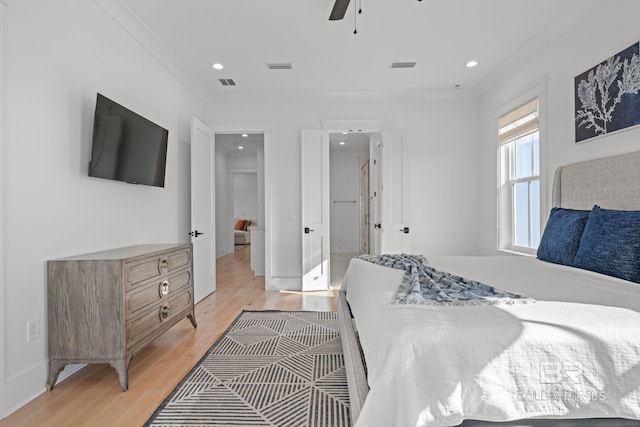 16761 Perdido Key Dr, Pensacola, FL 32507 - bedroom featuring crown molding, light hardwood / wood-style floors, and ceiling fan