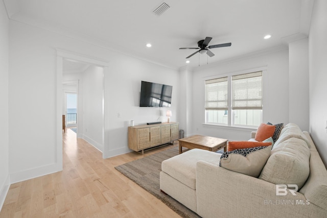 16761 Perdido Key Dr, Pensacola, FL 32507 - living room with crown molding, ceiling fan, and light hardwood / wood-style flooring