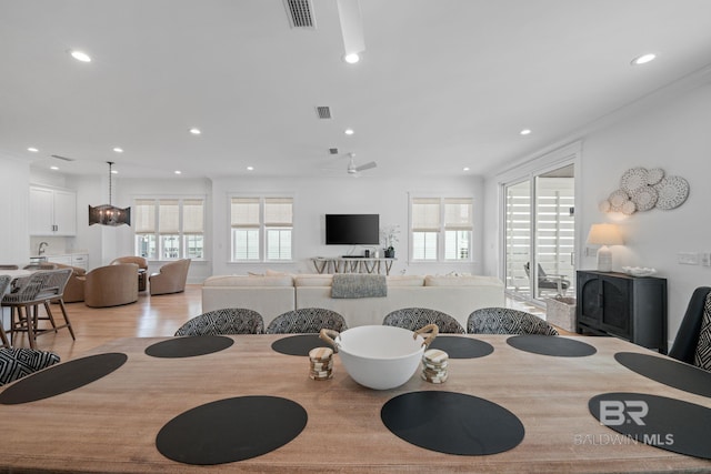 16761 Perdido Key Dr, Pensacola, FL 32507 - dining space with light hardwood / wood-style flooring and ceiling fan