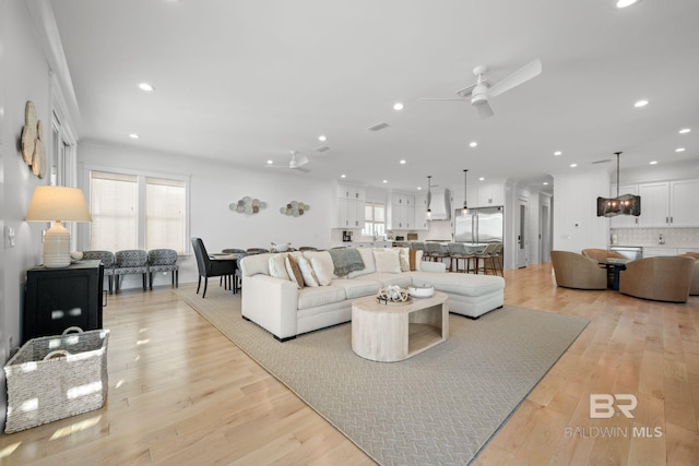 16761 Perdido Key Dr, Pensacola, FL 32507 - living room with ceiling fan and light hardwood / wood-style flooring
