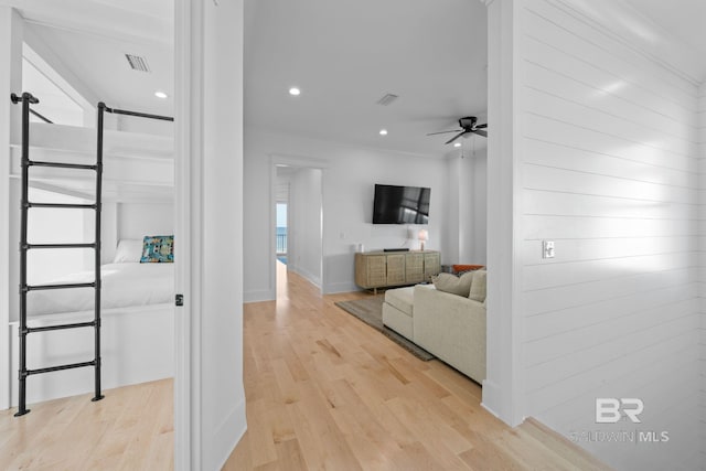 16761 Perdido Key Dr, Pensacola, FL 32507 - living room featuring light wood-type flooring, ceiling fan, and crown molding