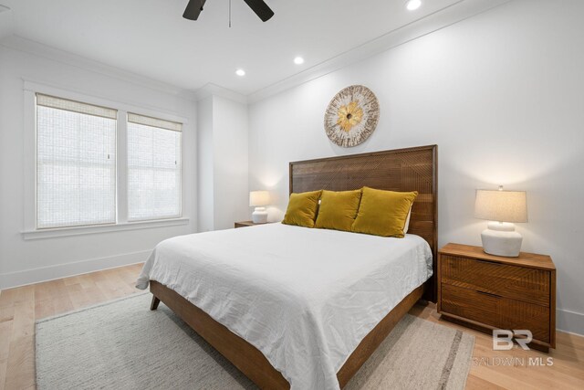 16761 Perdido Key Dr, Pensacola, FL 32507 - bedroom with crown molding, ceiling fan, and light hardwood / wood-style flooring