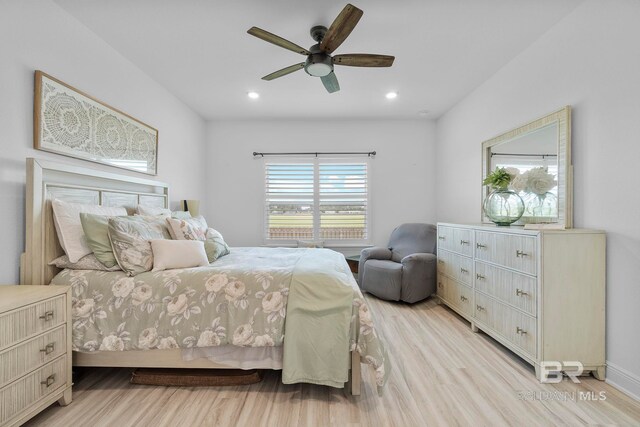 4175 Montague Dr, Gulf Shores, AL 36542 - bedroom with light wood finished floors, recessed lighting, and ceiling fan
