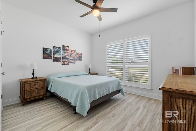 4175 Montague Dr, Gulf Shores, AL 36542 - bedroom featuring light wood-type flooring and a ceiling fan