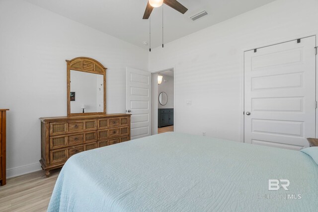 4175 Montague Dr, Gulf Shores, AL 36542 - bedroom featuring light wood finished floors, lofted ceiling, and ceiling fan