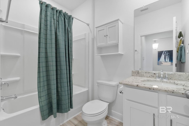 4175 Montague Dr, Gulf Shores, AL 36542 - bathroom with shower / bath combo, vanity, and wood finished floors