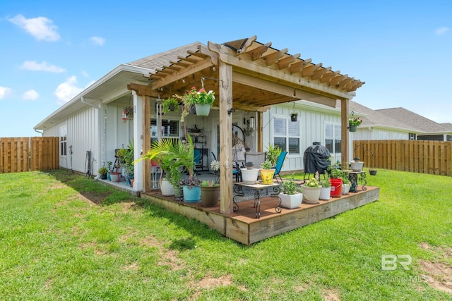 4175 Montague Dr, Gulf Shores, AL 36542 - rear view of property featuring board and batten siding and a fenced backyard