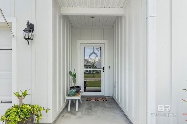 4175 Montague Dr, Gulf Shores, AL 36542 - doorway to property featuring board and batten siding and a porch