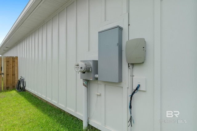 4175 Montague Dr, Gulf Shores, AL 36542 - exterior view of board and batten siding and electric meter