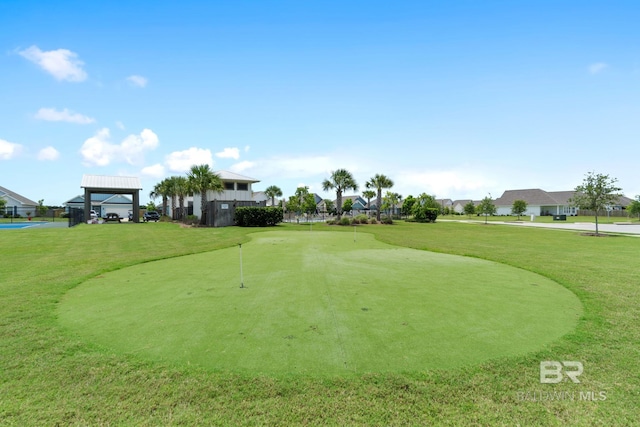 4175 Montague Dr, Gulf Shores, AL 36542 - view of home's community featuring a lawn, a gazebo, a putting green, and golf course view