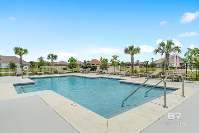 4175 Montague Dr, Gulf Shores, AL 36542 - community pool with a patio area and a residential view