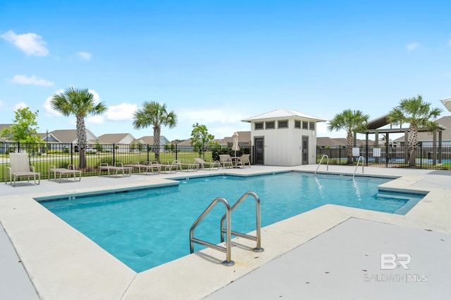 4175 Montague Dr, Gulf Shores, AL 36542 - community pool featuring a residential view and a patio