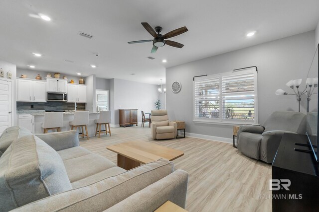 4175 Montague Dr, Gulf Shores, AL 36542 - living room featuring a ceiling fan, light wood-type flooring, and recessed lighting