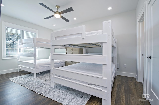 bedroom featuring dark wood-type flooring and ceiling fan