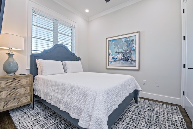 bedroom featuring dark hardwood / wood-style flooring and ornamental molding