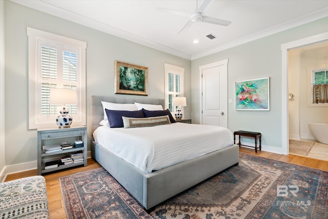 bedroom featuring crown molding, wood-type flooring, and ceiling fan