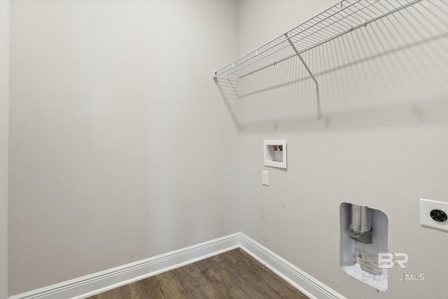 clothes washing area featuring washer hookup, baseboards, hookup for an electric dryer, and dark wood-style floors