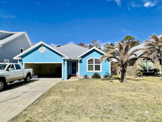 ranch-style home with a garage and a front lawn