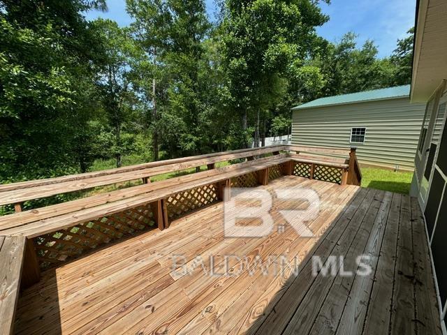 32807 N Pickens Ave, Lillian, AL 36549 - view of wooden deck