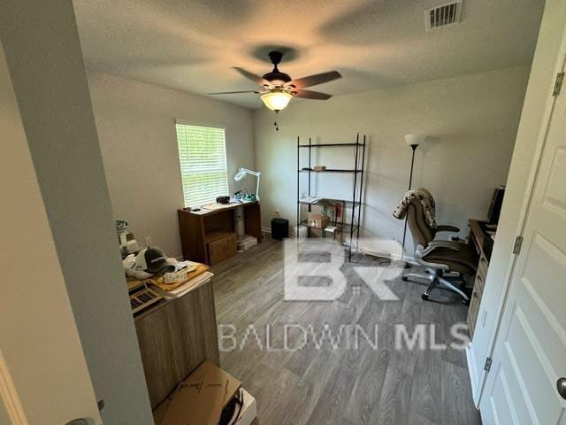 32807 N Pickens Ave, Lillian, AL 36549 - office space with wood finished floors, a ceiling fan, and baseboards