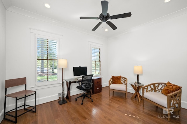 office area featuring crown molding, hardwood / wood-style flooring, plenty of natural light, and ceiling fan