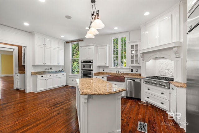 251 S Georgia Ave, Mobile, AL 36604 - kitchen with white cabinetry, stainless steel appliances, and a sink